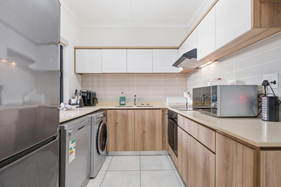 dishwasher, microwave, oven, stove, stove, toaster, washing machine, kitchen