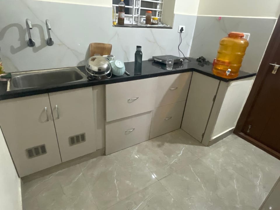 2 Bhk Apartment, 2 bed rooms, living area and kitchen for upto 4 Adults Apartment in Hyderabad
