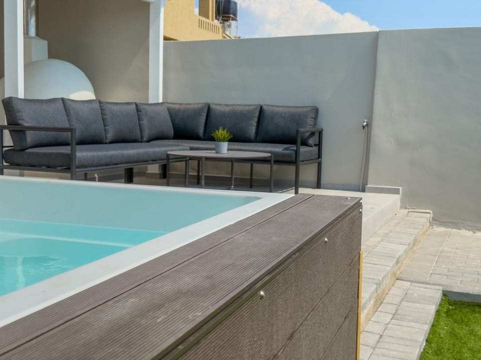 Property building, Living room, Swimming pool