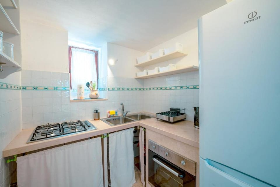 Kitchen or kitchenette, stove