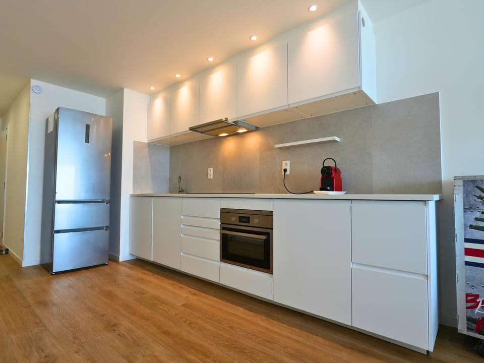 Kitchen or kitchenette, dishwasher, oven, stove