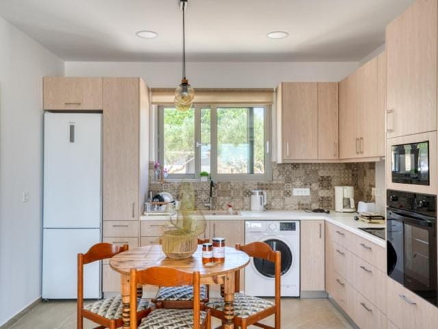Kitchen or kitchenette, oven, stove, toaster