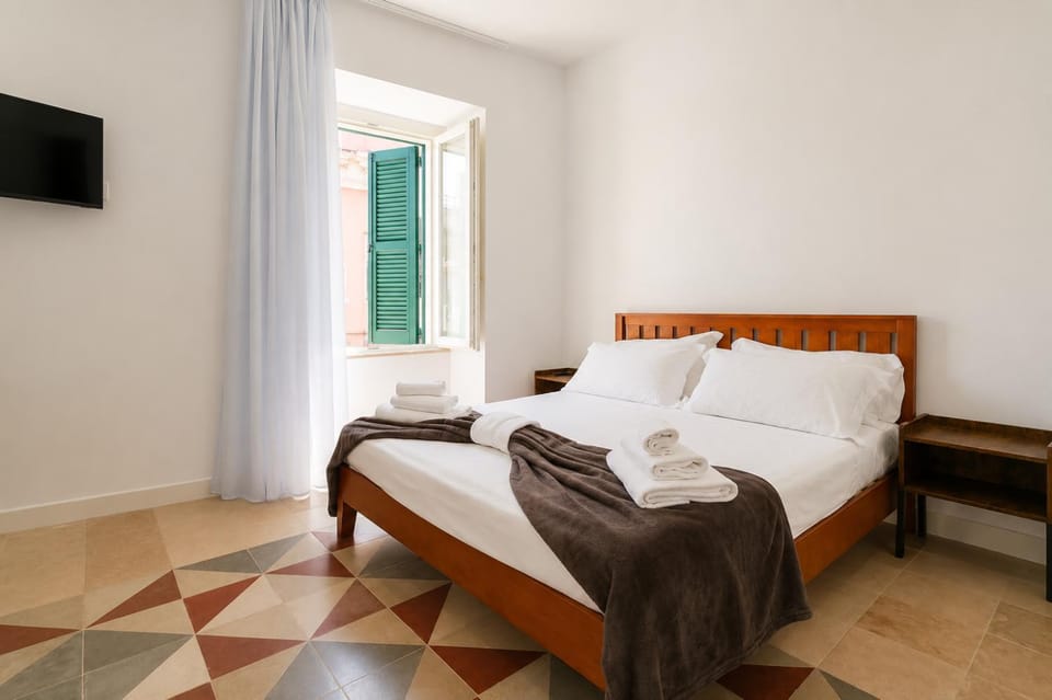 Palazzo Vignola by Apulia Accommodation Apartment in Bari