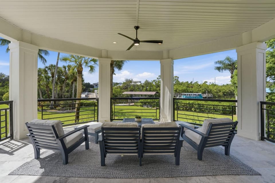 Riverfront Retreat with Pool Spa & Dock House in Estero