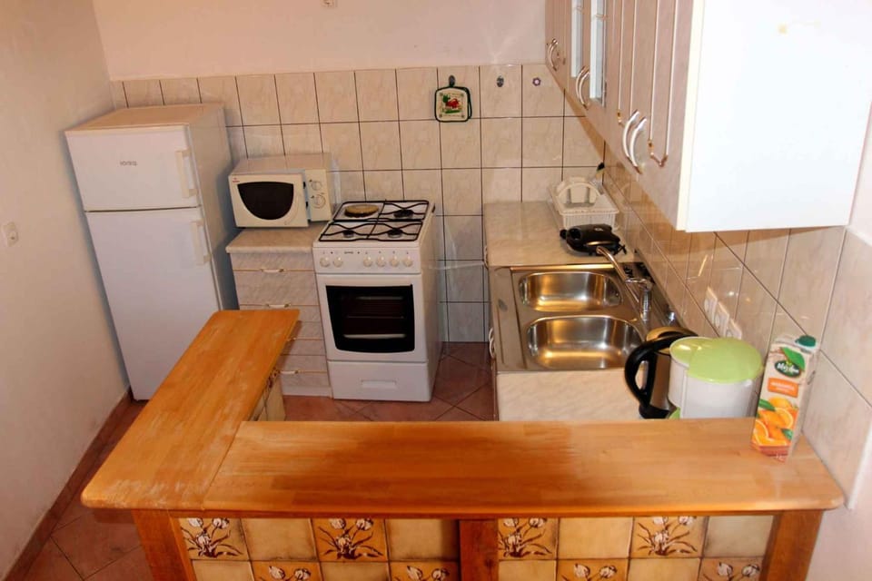 Kitchen or kitchenette, microwave