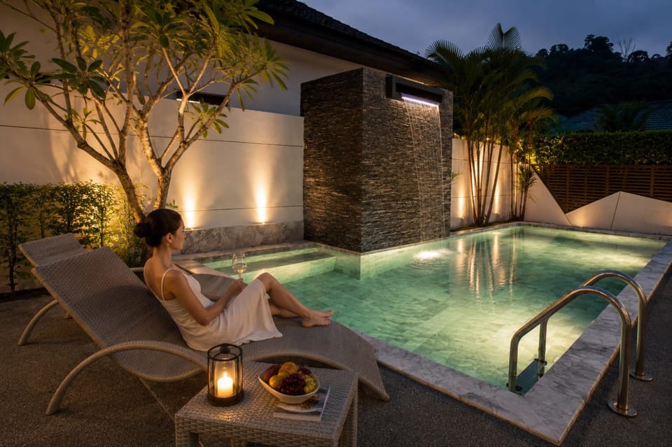 Patio, Night, Pool view, Swimming pool, group of guests, sunbed