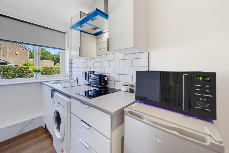 Kitchen or kitchenette, microwave