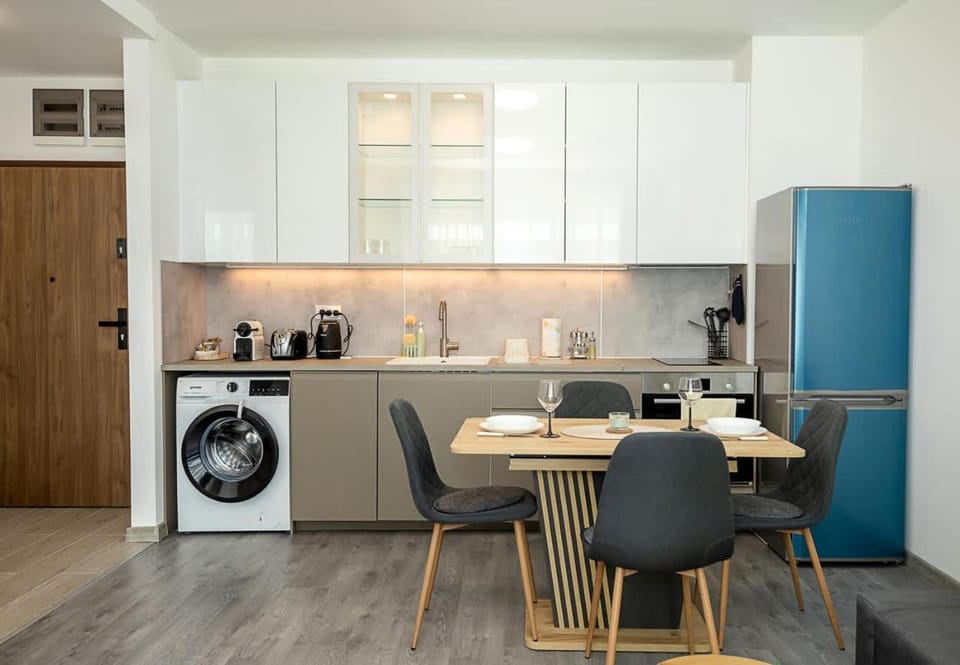 Coffee/tea facilities, Kitchen or kitchenette, Living room, Seating area, Dining area, dishwasher, oven, stove, toaster, washing machine