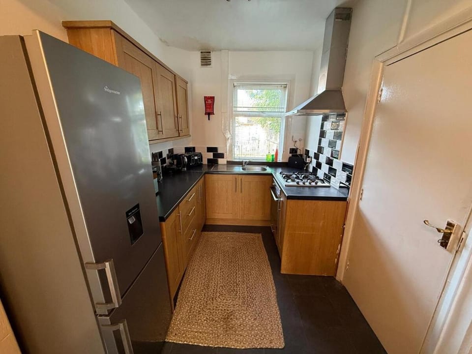 Kitchen or kitchenette, microwave, oven, stove, kitchen