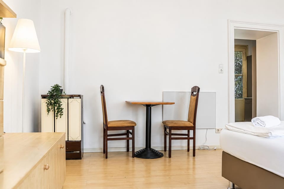 Bed, Seating area, Dining area, Bedroom