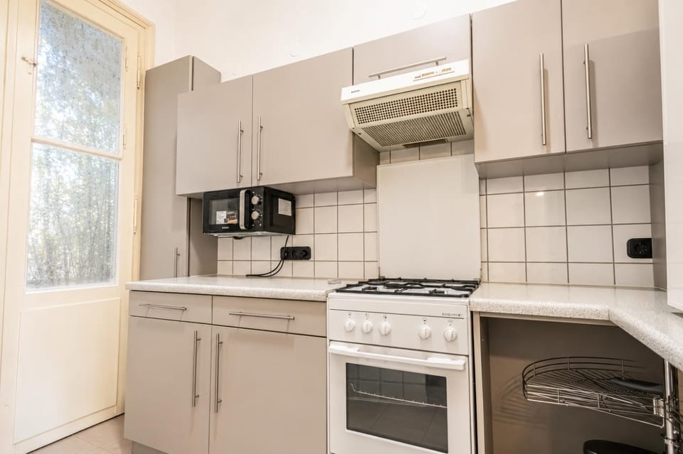 Kitchen or kitchenette, stove, toaster
