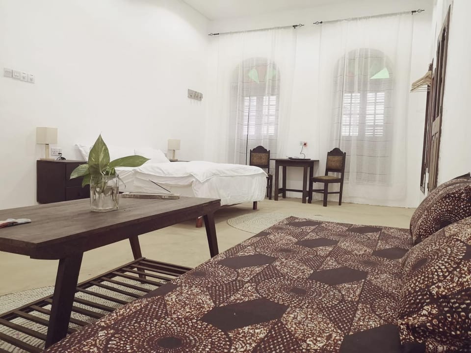 Bed, Seating area, Bedroom