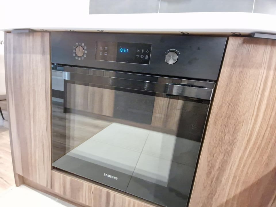 Kitchen or kitchenette, oven