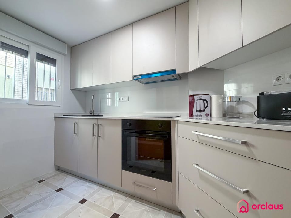 Kitchen or kitchenette, stove, toaster