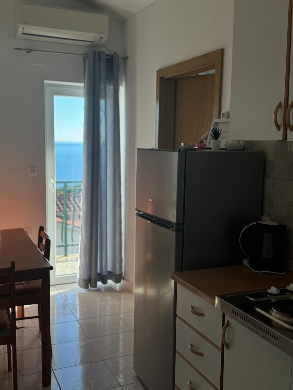 Kitchen or kitchenette, stove