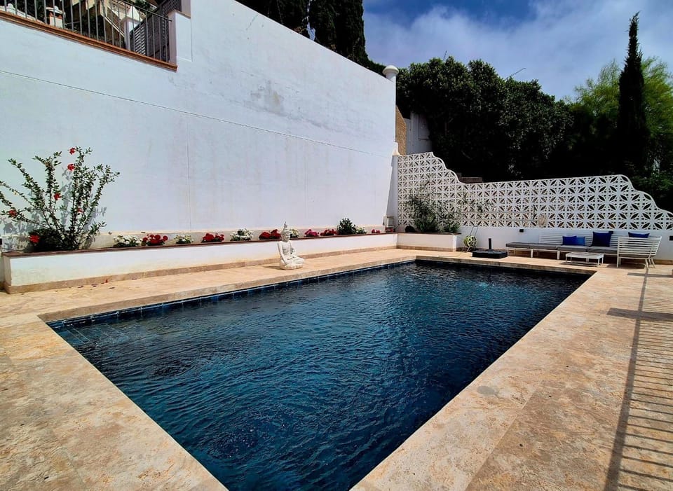 Property building, Living room, Swimming pool