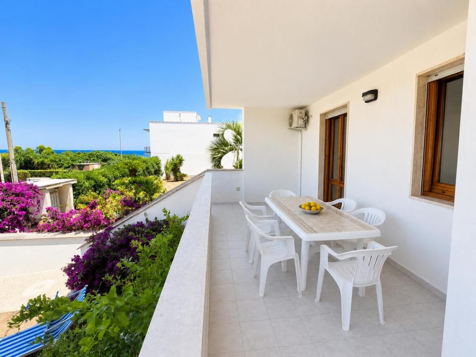 Property building, Patio, Day, Natural landscape, View (from property/room), Balcony/Terrace, Balcony/Terrace, Living room, Seating area, Dining area, Sea view