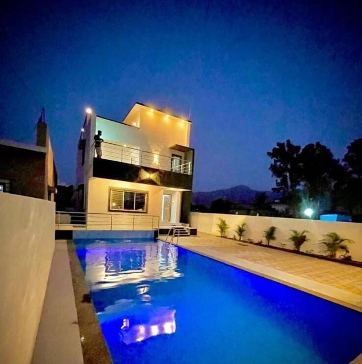 Property building, Night, Mountain view, Pool view, Swimming pool