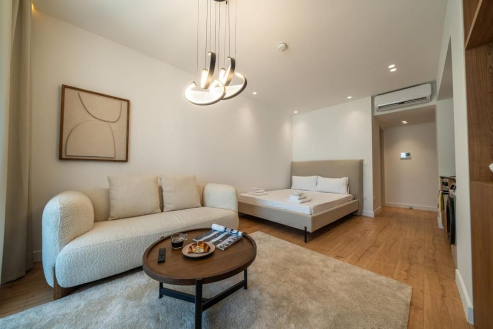 Bed, Living room, Seating area, Bedroom