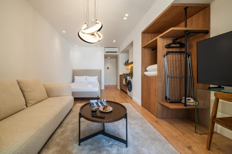 Bed, TV and multimedia, Living room, Seating area, Bedroom, wardrobe