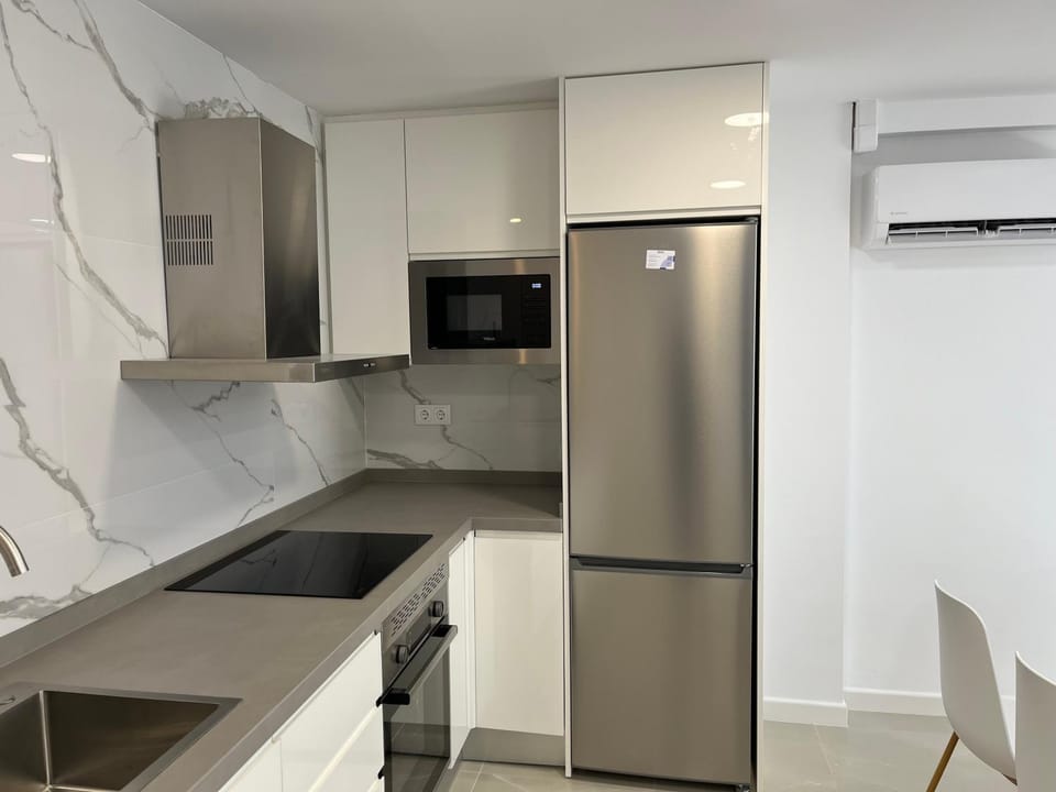 Kitchen or kitchenette, oven, stove