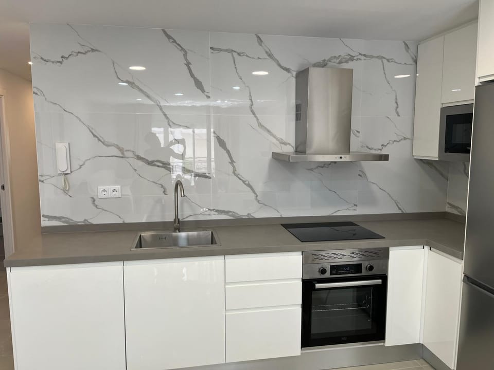 Kitchen or kitchenette, oven, stove