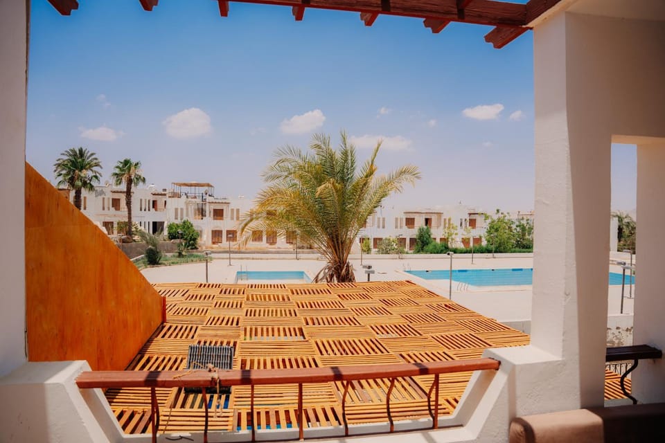 Patio, Day, Lake view, Pool view, Swimming pool, sunbed