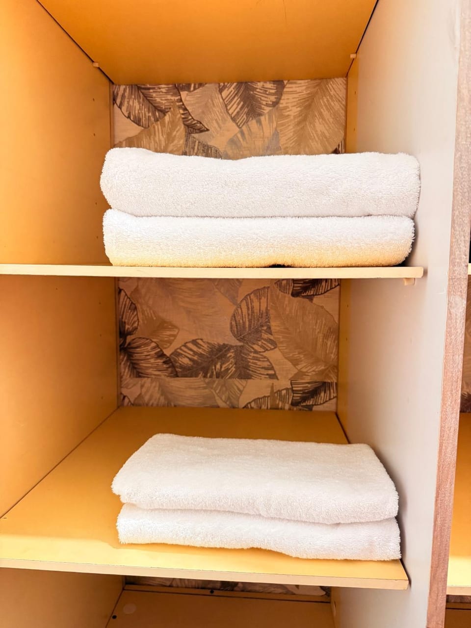 bunk bed, towels, wardrobe