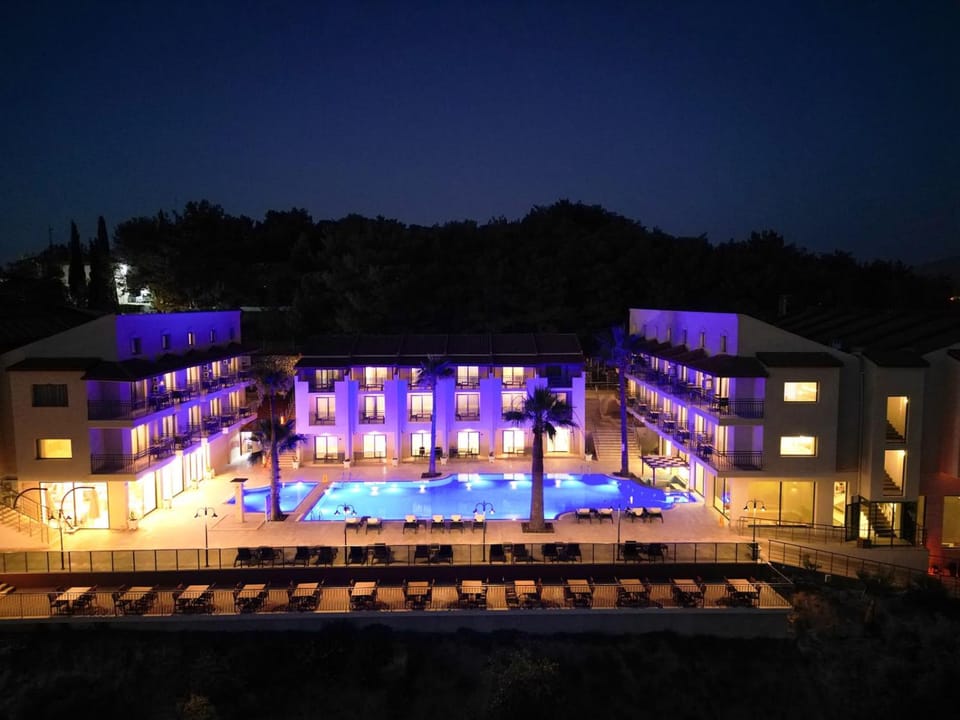 Property building, Night, Pool view, Swimming pool, sunbed