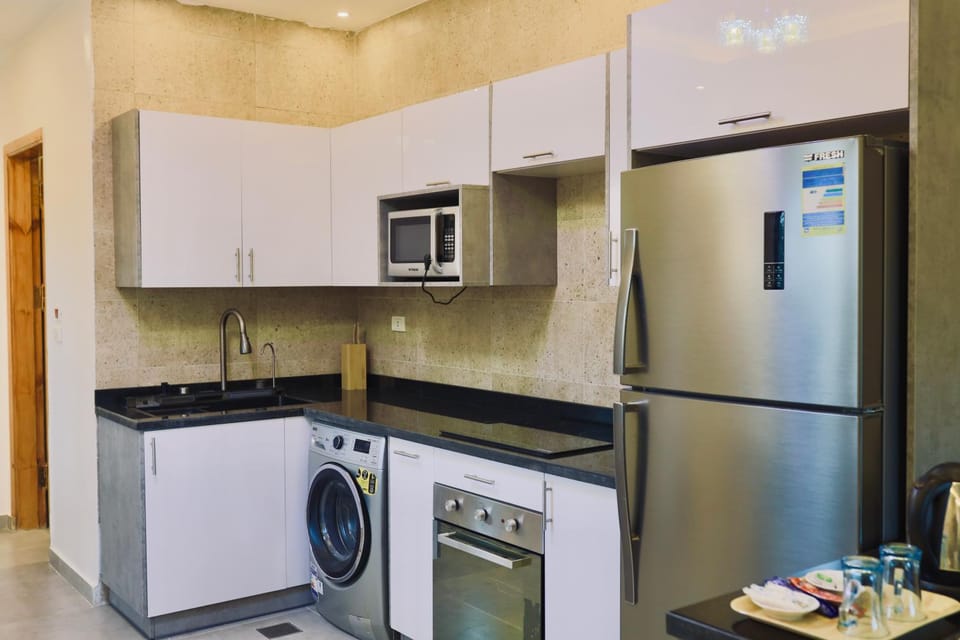 Kitchen or kitchenette, washing machine