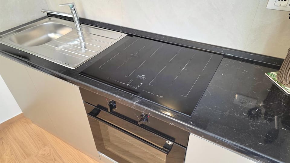 Kitchen or kitchenette, stove