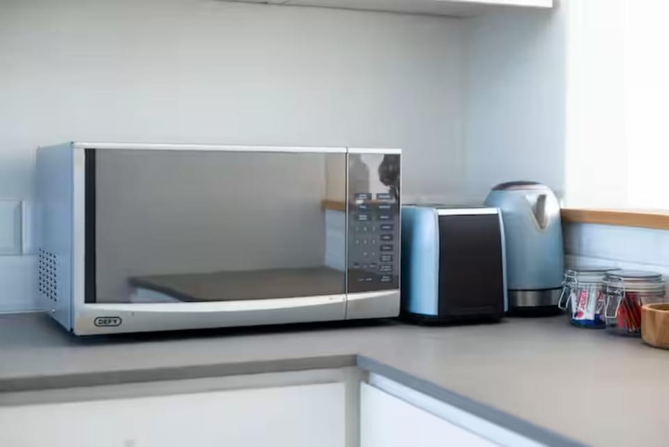 Kitchen or kitchenette, oven, toaster