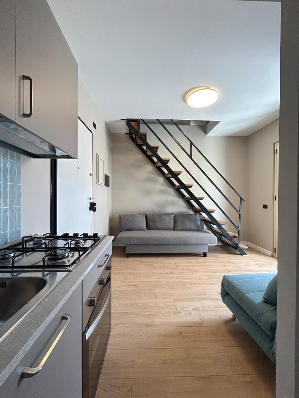 Kitchen or kitchenette, Living room, stove
