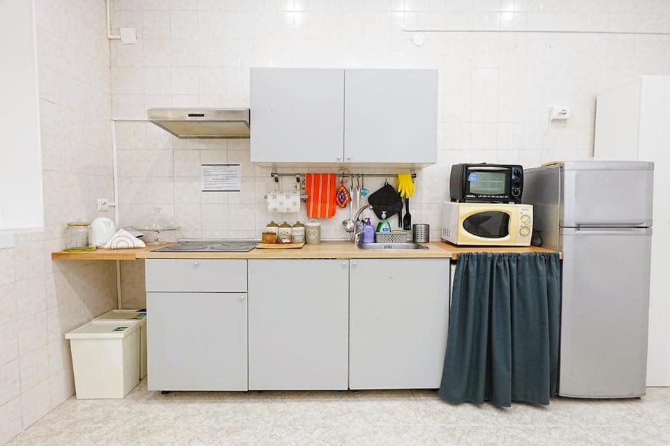 Kitchen or kitchenette, stove, toaster