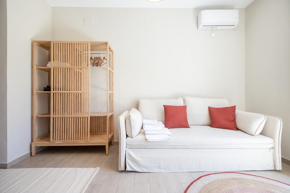 Living room, Photo of the whole room, Seating area, wardrobe, air conditioner