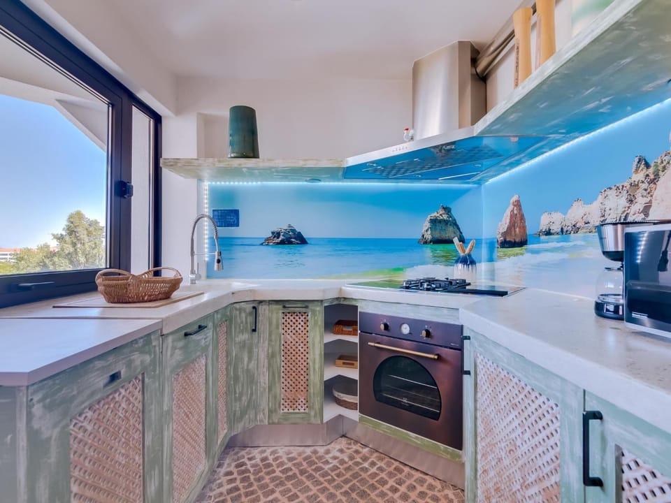 Kitchen or kitchenette, stove, toaster