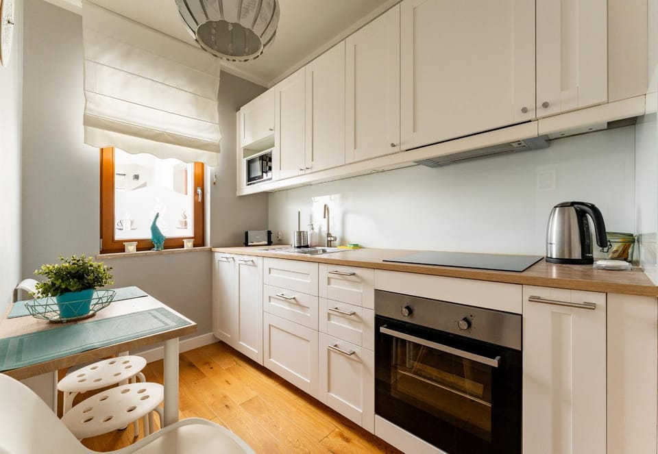 Kitchen or kitchenette, Dining area, dishwasher, stove, toaster