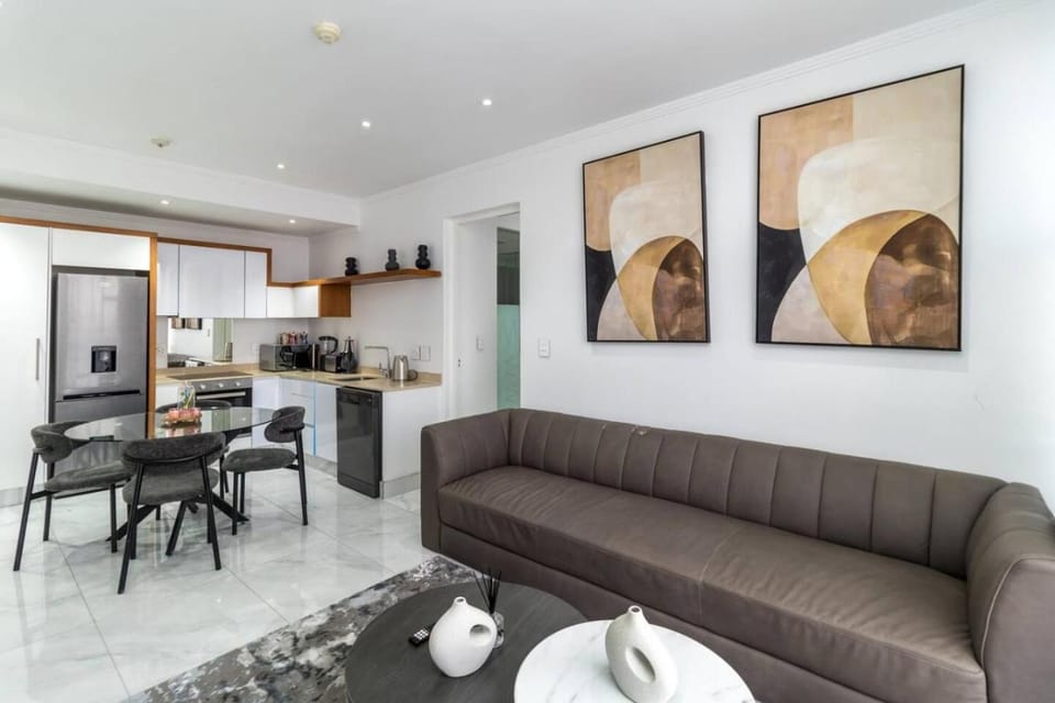 TV and multimedia, Kitchen or kitchenette, Living room, Seating area, Dining area, oven, stove, toaster