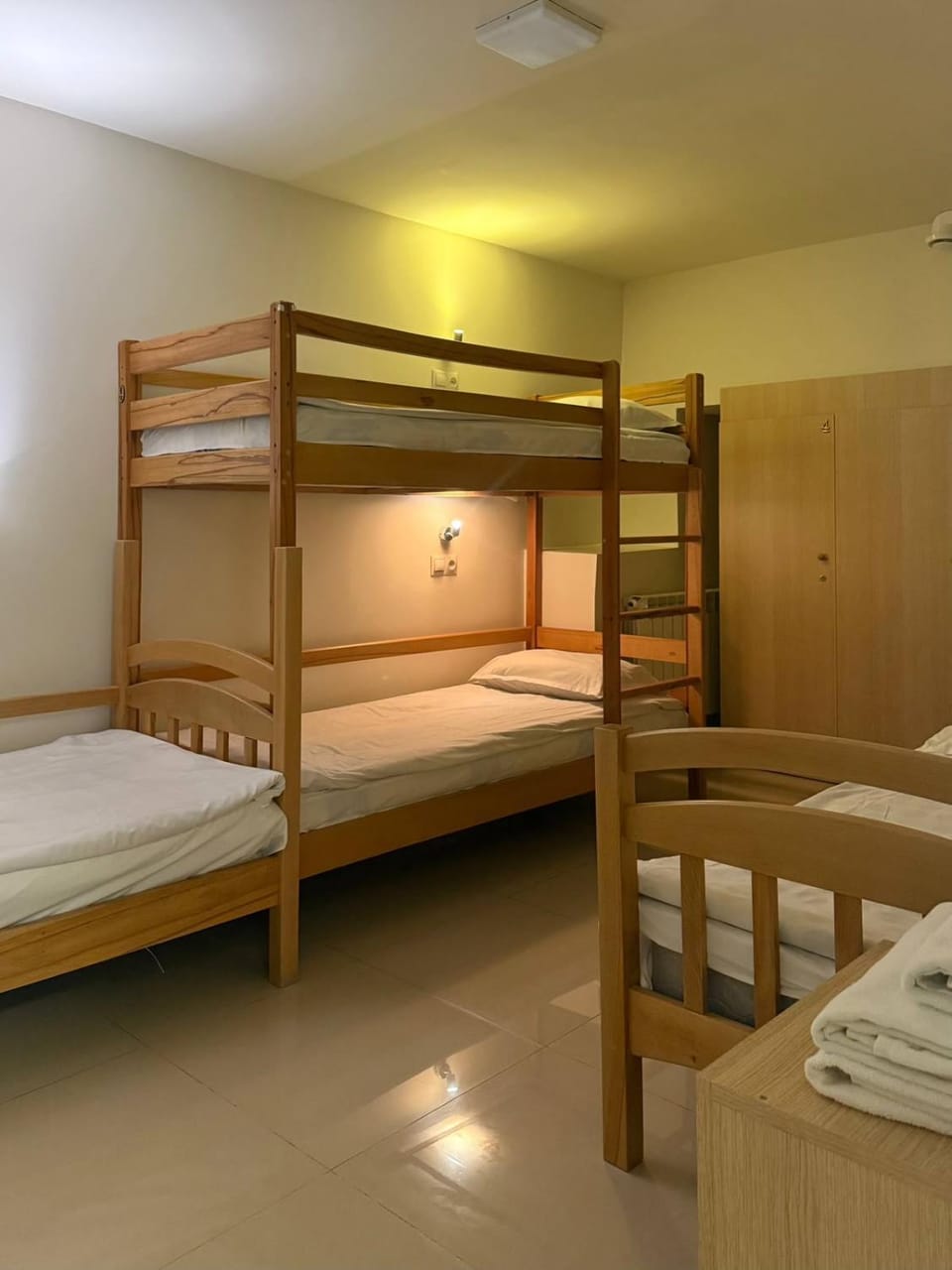 Bed, Photo of the whole room, Bedroom, bunk bed, towels, wardrobe