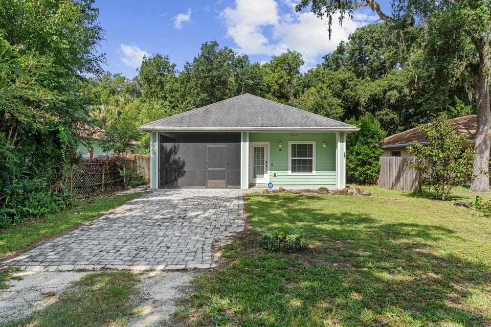 Relax in Palm Coast Hot Tub, Fire Pit, Gourmet Kitchen & Coastal Charm House in Palm Coast