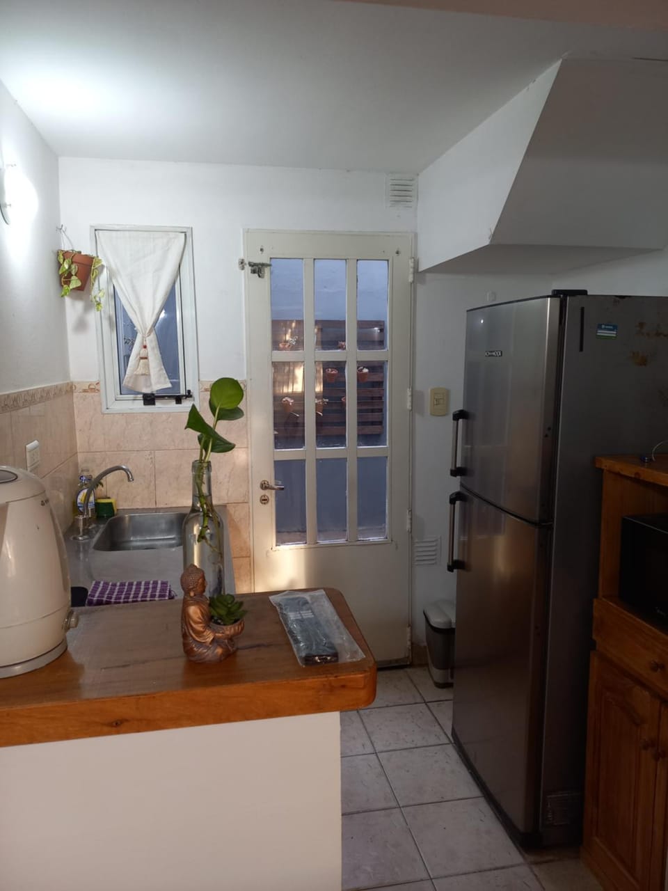 Kitchen or kitchenette, microwave, oven, toaster