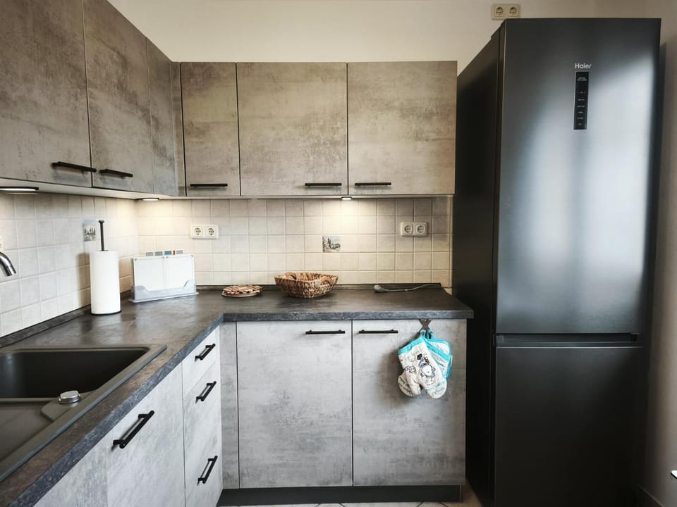 Kitchen or kitchenette, oven, stove