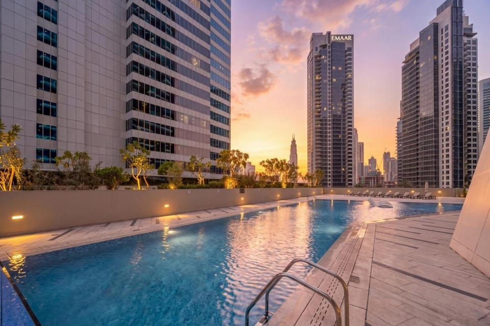 Property building, Day, City view, Swimming pool, Sunrise, Sunset, sunbed