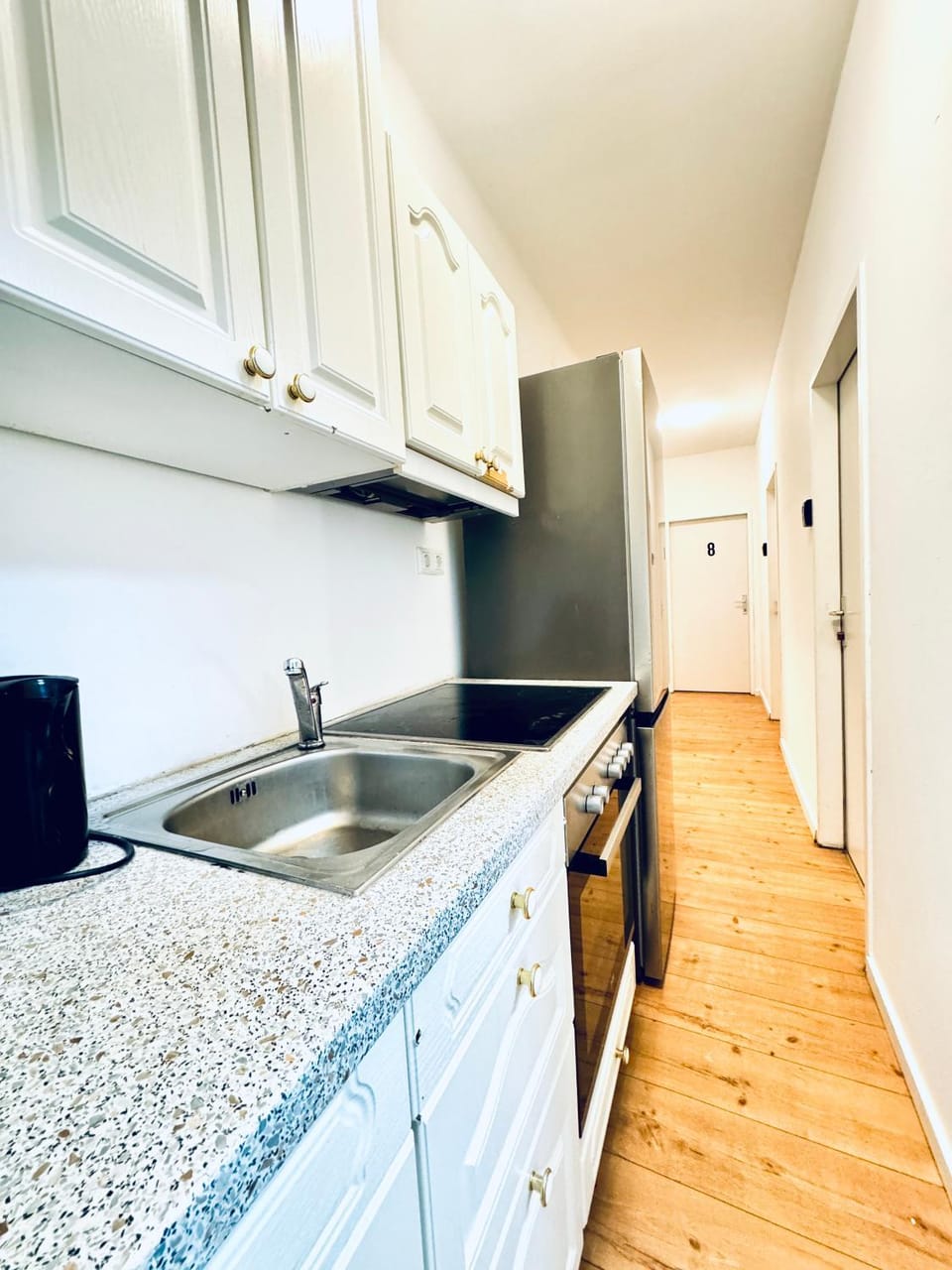 Kitchen or kitchenette, stove