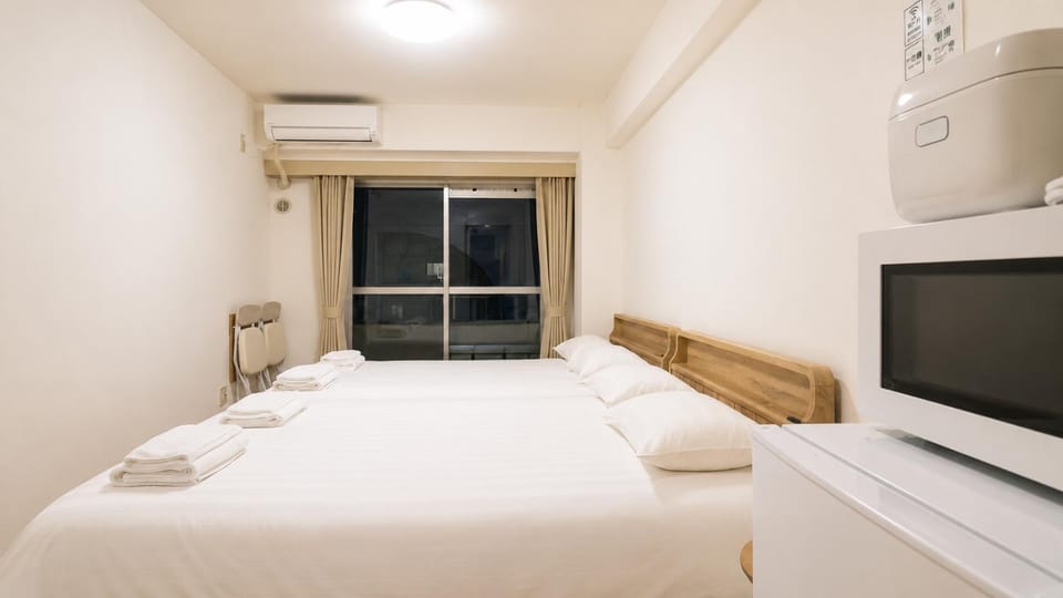 Bed, Photo of the whole room, Bedroom, towels, air conditioner