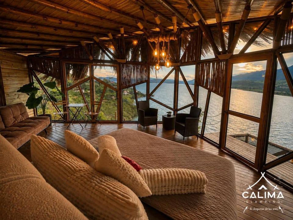 Bed, Natural landscape, View (from property/room), Balcony/Terrace, Living room, Seating area, Bedroom, Lake view, River view