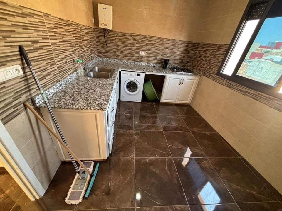 Kitchen or kitchenette, dishwasher, washing machine
