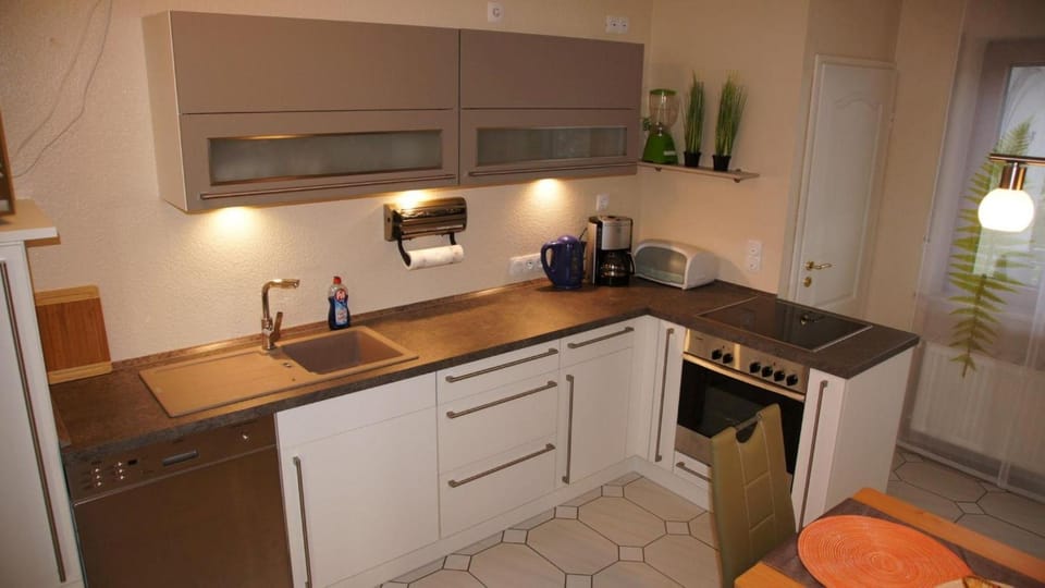Kitchen or kitchenette, oven, stove