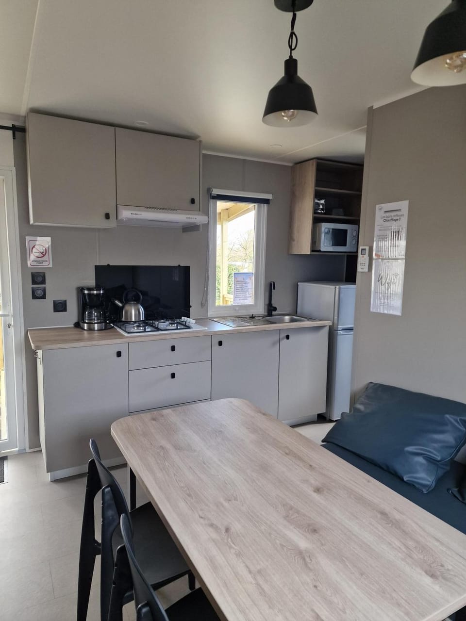 Camping Les P'tites Maisons dans la Prairie Campground/ 
RV Resort in Pays de la Loire