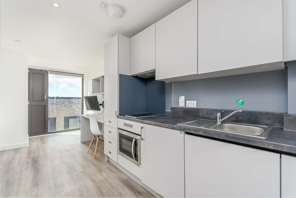 Kitchen or kitchenette, stove